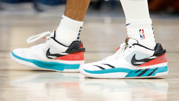 View Ja Morant's white and black Nike shoes.